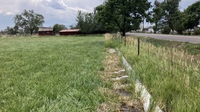 View of gated pipe irrigation from NW corner of property