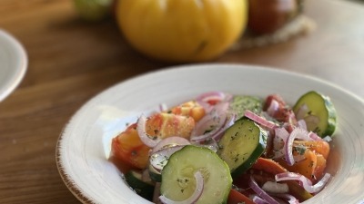 My "House Salad" made with all homegrown ingredients: heirloom tomatoes, cucumbers, red onion, dried oregano.