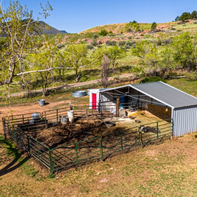 This photo shows the loafing shed in one of the pastures as it was used for pigs.